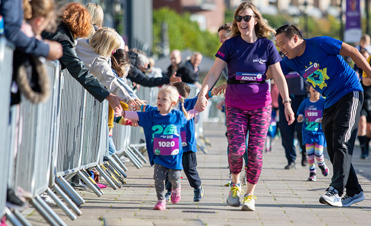 High fives for junior and mini great north run runners. Gallery 2022