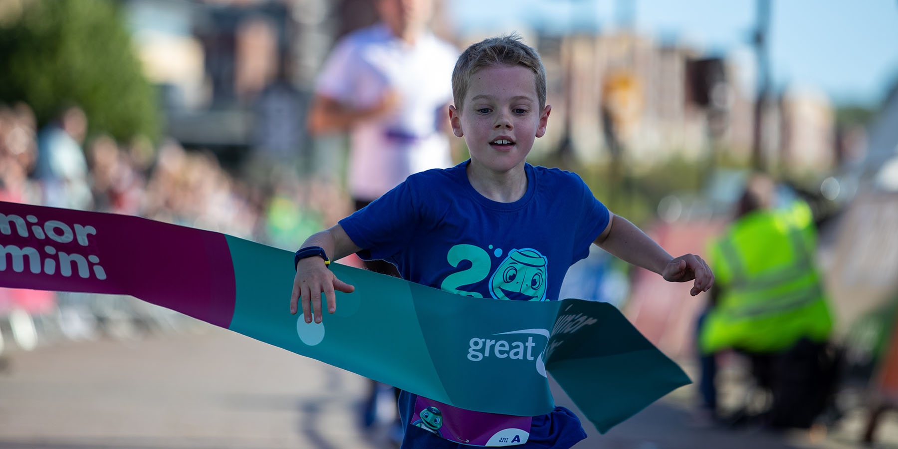 Junior and Mini Great North Run runner crosses the finish line. Gallery 2022