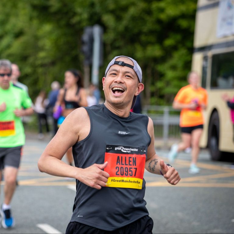 man running and smiling