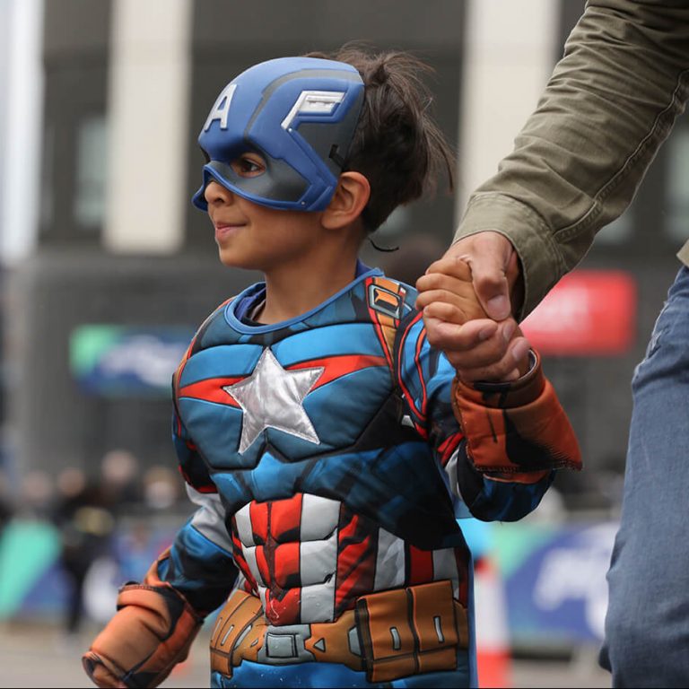 boy in superhero costume